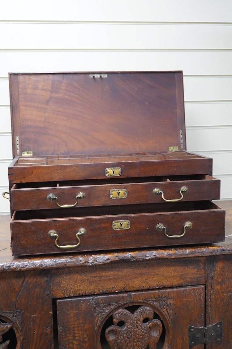 A mahogany table top three drawer stationery chest, 62cm wide, 25cm high, 29cm deep. Condition - fair